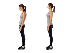 Standing woman demonstrating good posture and bad posture
