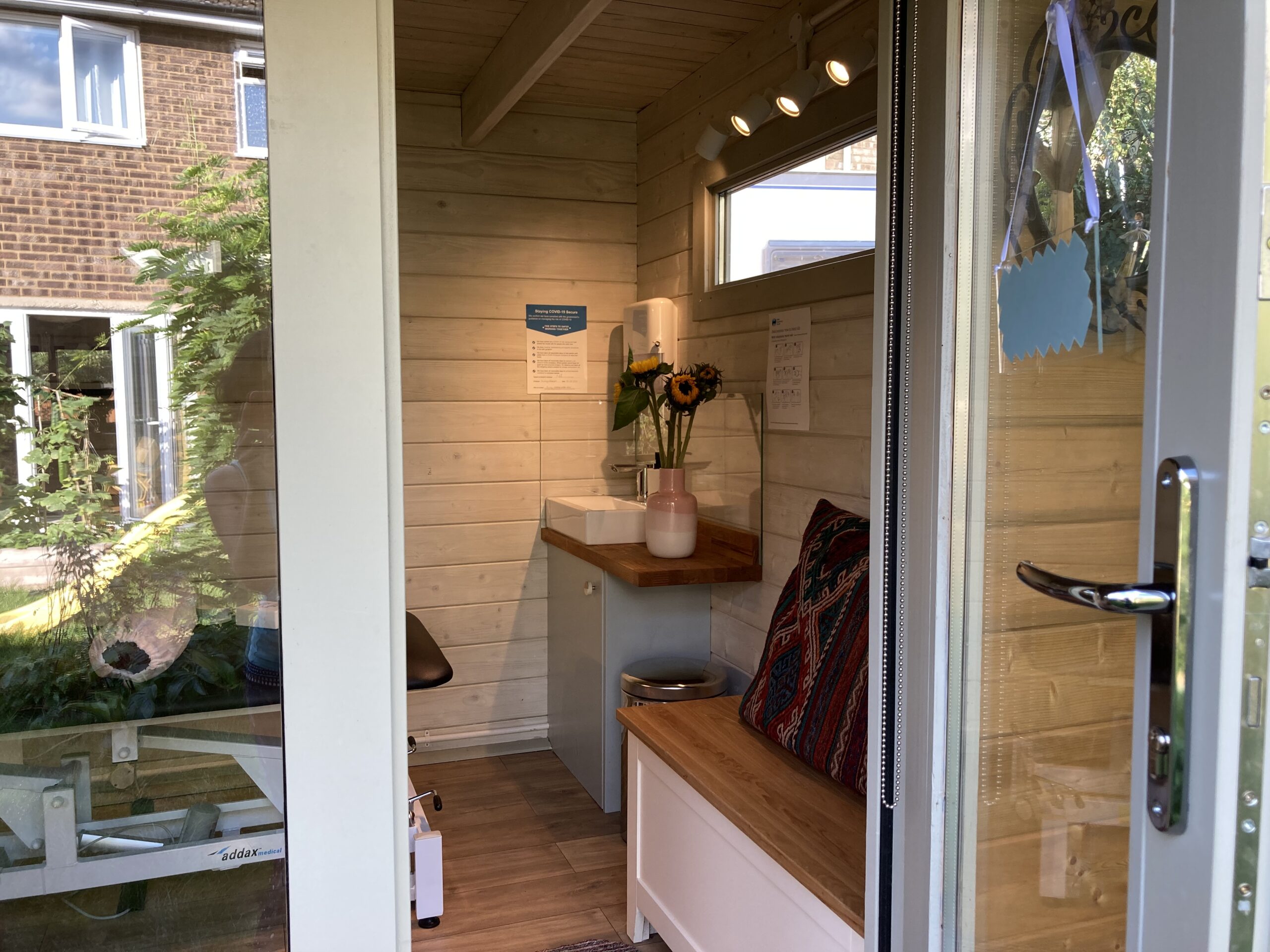 Open door to acupuncture clinic seating area